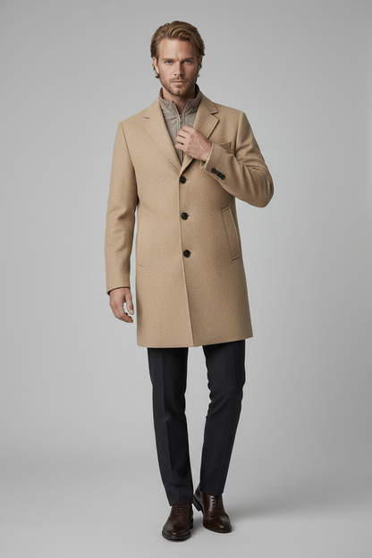 Man wearing a stylish Coat windvanger camel, showcasing modern design and integrated windbreaker features.