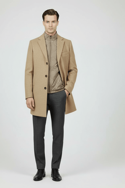 Man wearing a stylish Coat windvanger camel with a modern silhouette and integrated windbreaker.