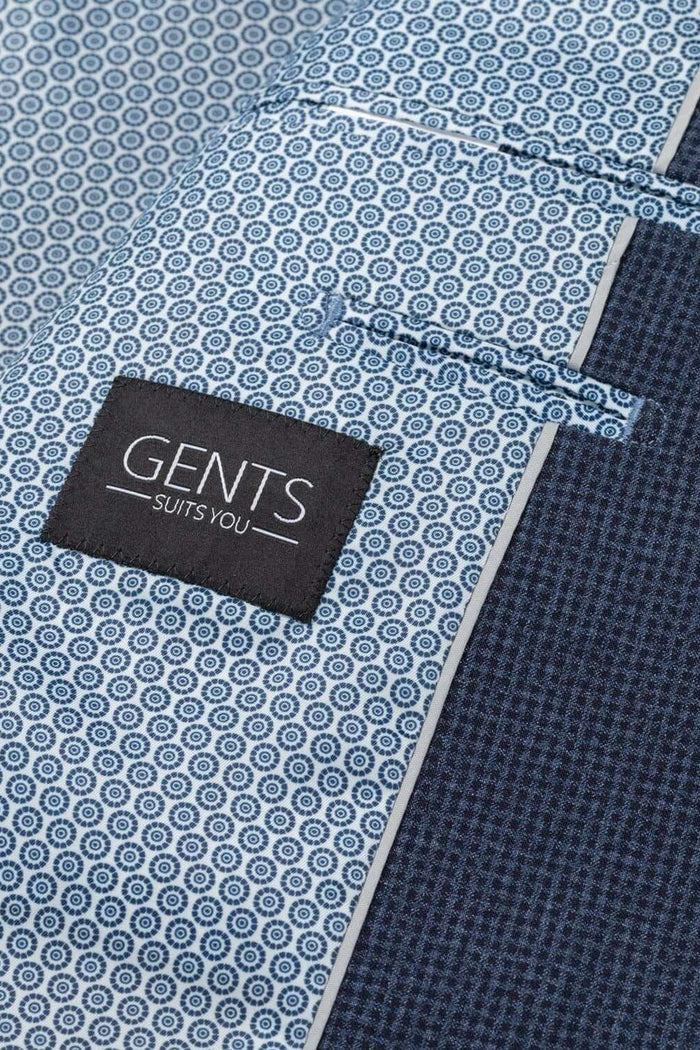 Colbert bi-stretch blauw detail van de stof met GENTS label en stijlvolle patronen.