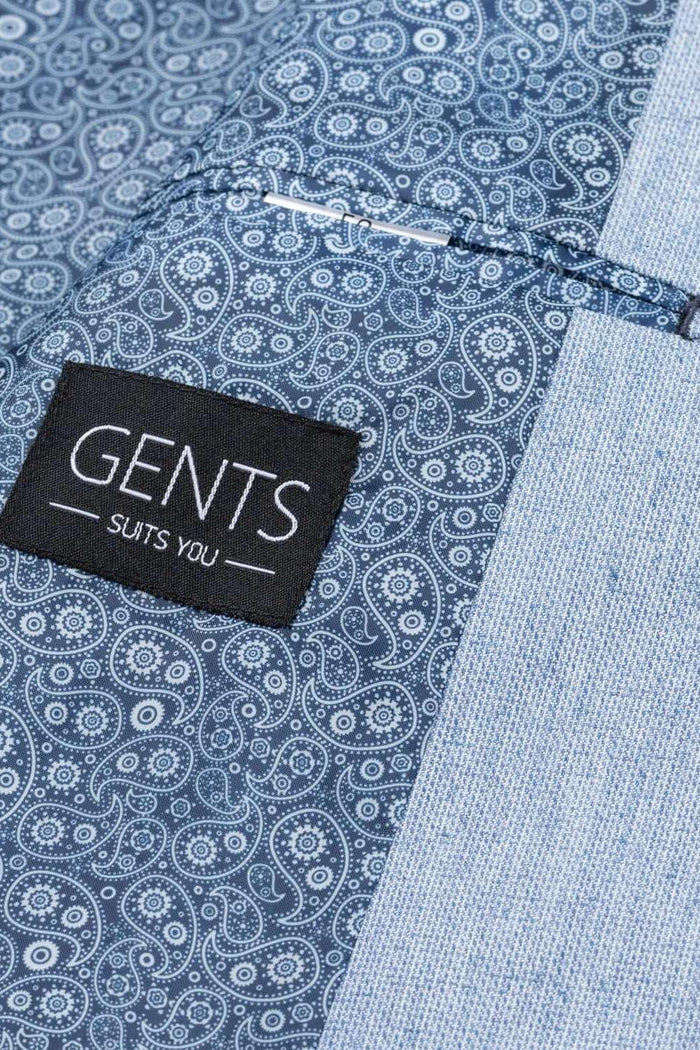 Colbert melange blauw detail showing GENTS label on stylish fabric for modern suits.