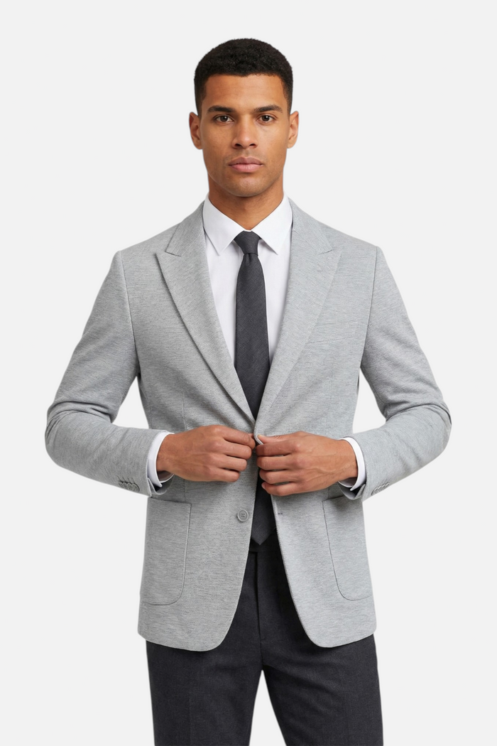 Colbert stretch lichtgrijs, comfortabel en kreukvrij, ideaal voor elke gelegenheid.