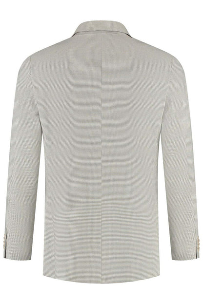Double-breasted pied-de-poule beige jasje achterkant met knopen en elegante structuur