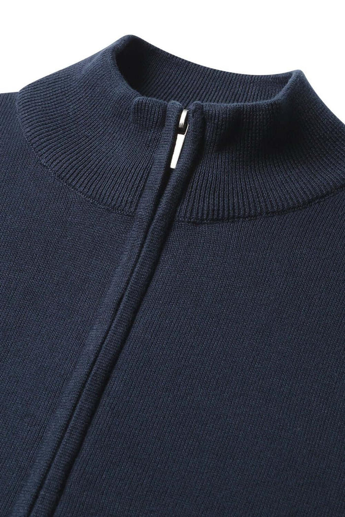 Close-up of a cozy Full zip navy jacket with a sleek zipper detail.
