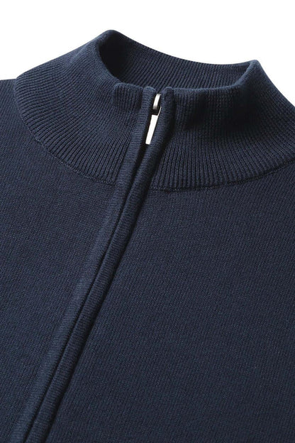 Close-up of a cozy Full zip navy jacket with a sleek zipper detail.