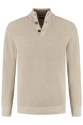 Half zip-knopen structuur ecru. Katoenen trui met knopen en halve ritssluiting in ecru kleur.
