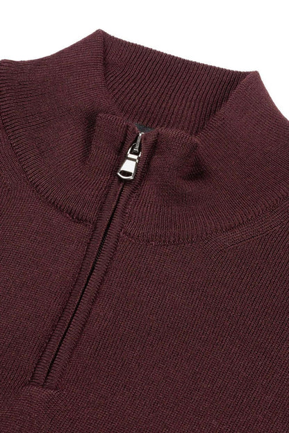 Halfzip merinoblend donker-bordeaux trui met handige ritssluiting en warme uitstraling.