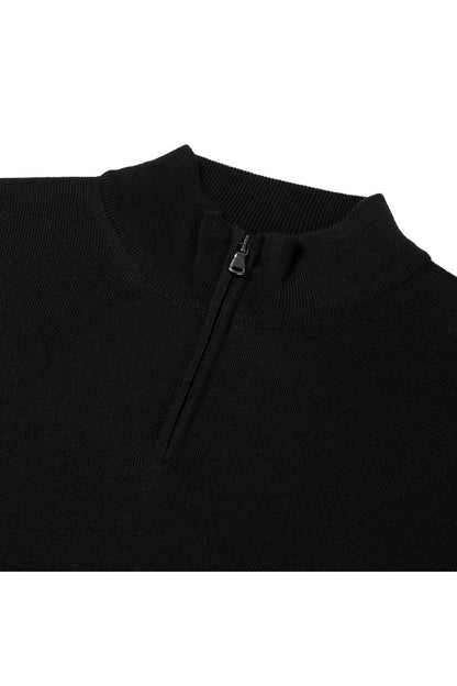 Halfzip merinoblend zwart met handige rits, perfect voor een warme en stijlvolle look.