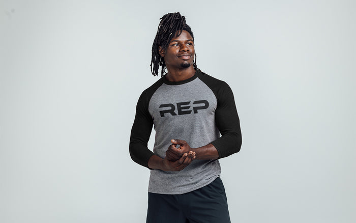 The REP Fitness Men's Daily Driver ¾ Sleeve Tri-Blend Crew T-Shirt in Heather Gray/Black on body