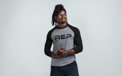 The REP Fitness Men's Daily Driver ¾ Sleeve Tri-Blend Crew T-Shirt in Heather Gray/Black on body