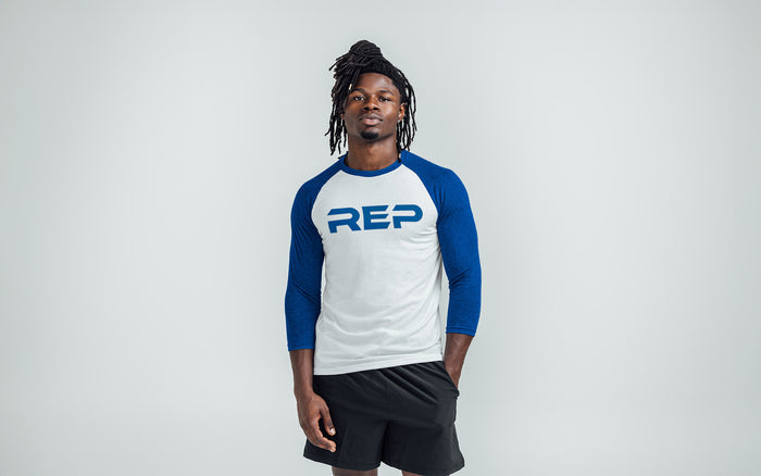 The REP Fitness Men's Daily Driver ¾ Sleeve Tri-Blend Crew T-Shirt in White/Royal on body