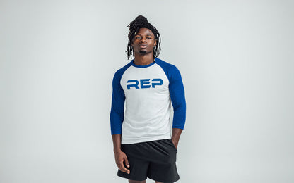 The REP Fitness Men's Daily Driver ¾ Sleeve Tri-Blend Crew T-Shirt in White/Royal on body