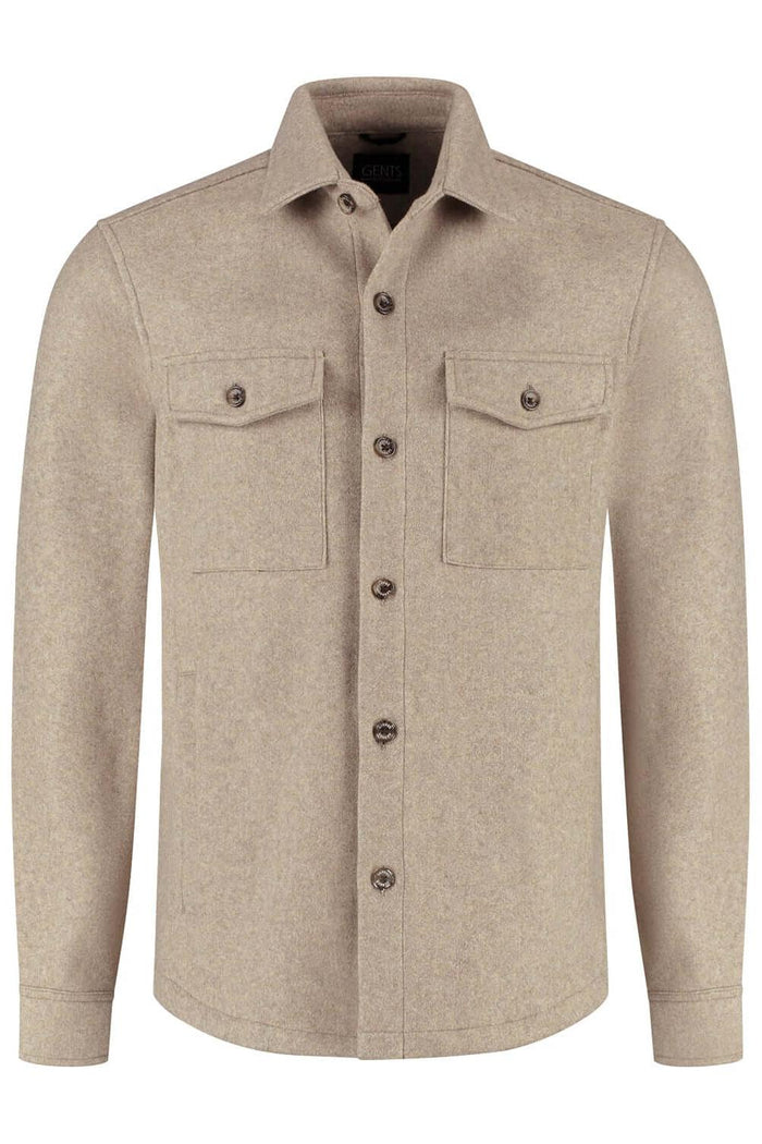 Overshirt beige met lange mouwen, knoopsluiting en borstzakken in een lichte kleur.