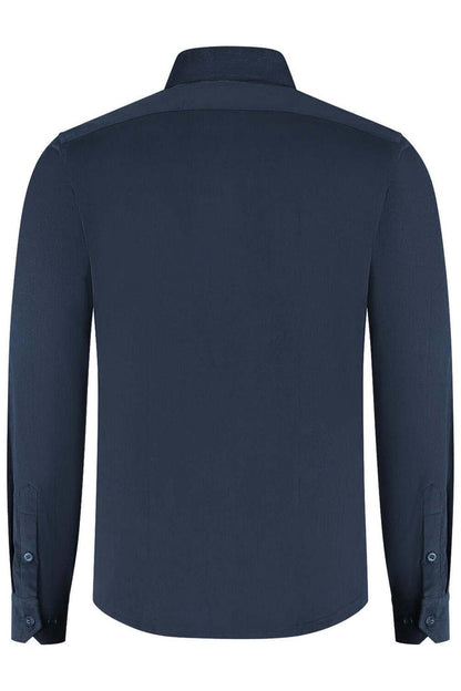 Overshirt corduroy blauw, donkerblauwe achterzijde van katoen met knoopsluiting.