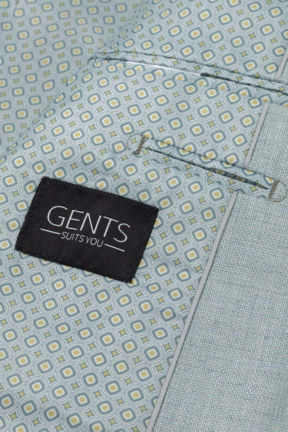 Detail van het Pak aquagroen 3-delig met GENTS label, modern design en stijlvolle pasvorm.