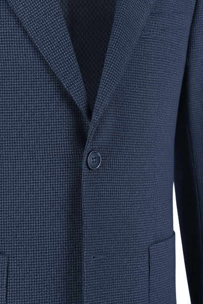 Colbert bi-stretch blauw | dicht bij de knoop en textuur van het moderne, kreukvrije colbert.