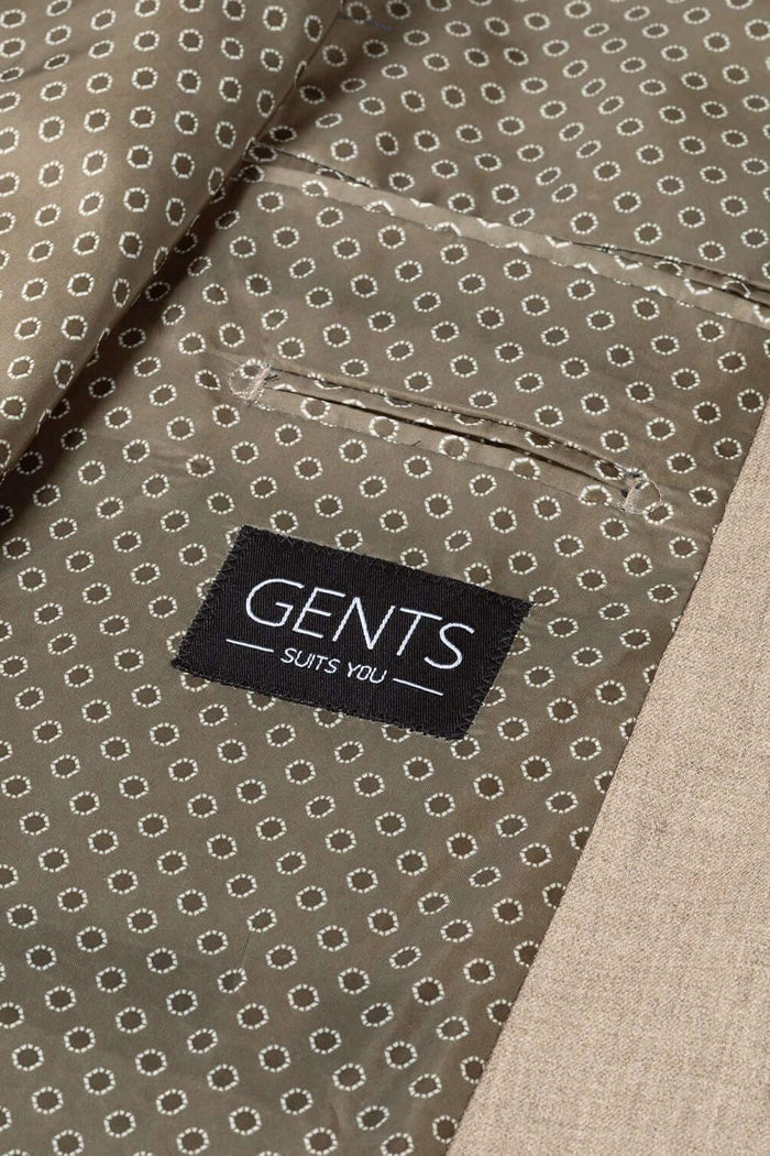 Pak cappuccino beige: binnenvoering van het pak met GENTS label en cirkelvormige print.