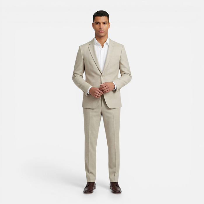 Pak pepita beige worn by a model, showcasing a modern fit and wrinkle-resistant design in beige tweed.