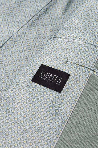Detail van een Pak stretch groen met GENTS label, ideaal voor zakelijk en sociaal gebruik.