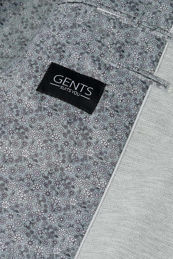 Colbert stretch pique melange grijs met bloemenprint en GENTS label zichtbaar.