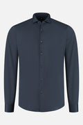 Pique structure stretch navy shirt shown in a front view with long sleeves and button closure.