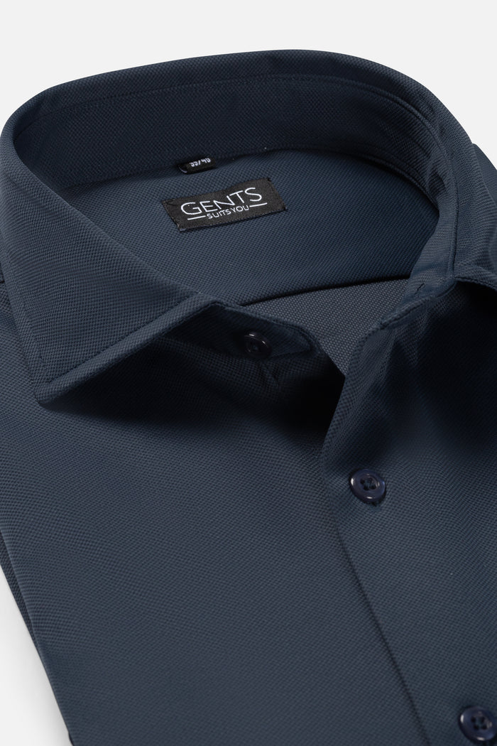 Pique structure stretch navy shirt showing collar and buttons, perfect for stylish casual wear.