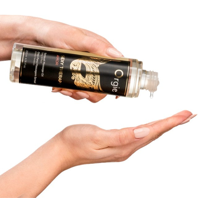 Ulei pentru masaj ORGIE Sexy Therapy Amor, cu ulei de migdale, efect hidratant, aromă de ananas și frezie, 200 ml