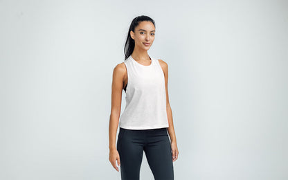 The REP Fitness Women's Peak Cropped Dual-Blend Tank in White/Aqua Gray on body